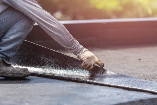 Professional Basement Waterproofing technician working in Ogdensburg, NY